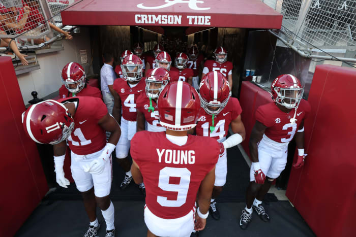 Bryce Young leads the players out of the tunnel